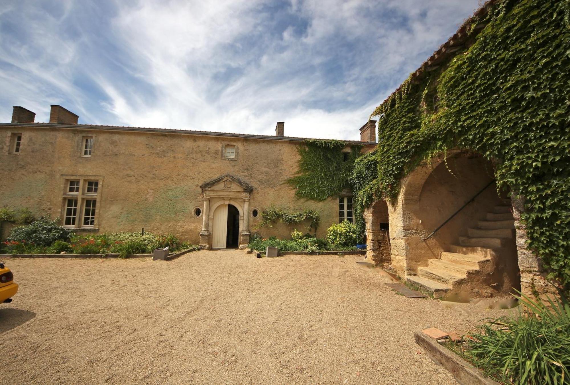 Bed and Breakfast Le Manoir De Gatines Tigné Exterior foto