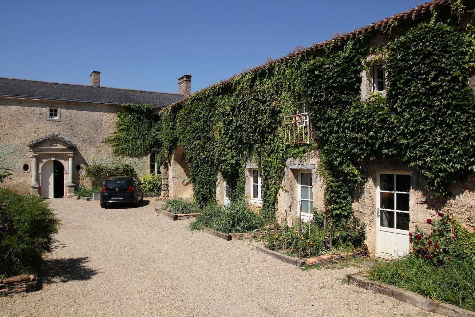 Bed and Breakfast Le Manoir De Gatines Tigné Exterior foto